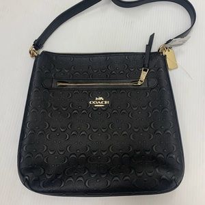 Black coach cross body purse. Smoke free. Pet free
